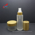 custom luxury glass pump lotion shampoo bottle with bamboo pump cap 50ml 100ml 200ml BJ-213B